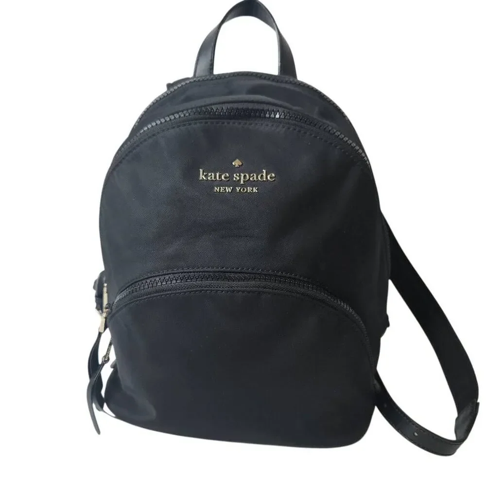 Kate Spade Karissa black nylon backpack, minimalist design.